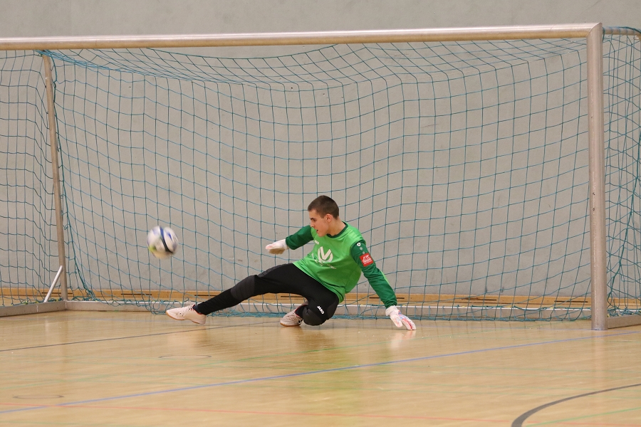 Foto Rocco Bartsch: Der entscheidende Moment im kleinen Finale - Moritz pariert den Achtmeterschuss per Fußabwehr